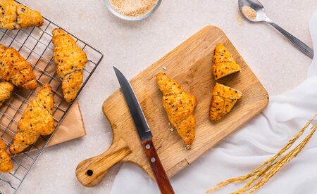 homemade whole wheat croissant bread on marble kitchen table, top viewの写真素材