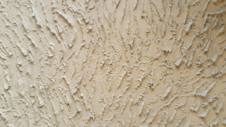 Tiny high relief line texture on a wall created by using color paint.