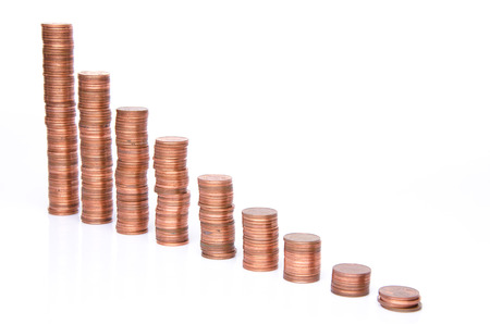 Stacks of copper coins, isolated on whiteの写真素材