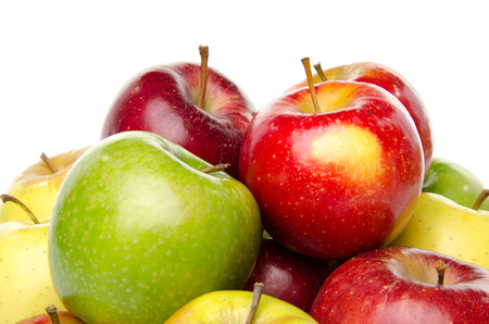 Bunch of different sorts of apples, isolated on whiteの写真素材