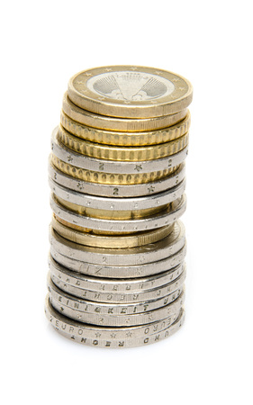 Stack of coins, isolated on whiteの写真素材