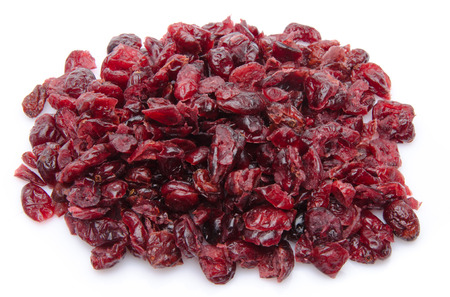 Heap of dried cranberries, isolated on whiteの写真素材