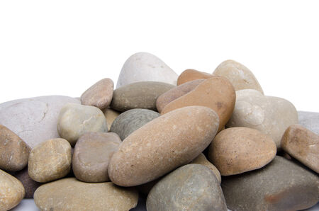 Pile of pebbles, isolated on whiteの写真素材