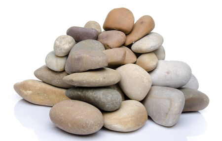 Pile of pebbles, isolated on whiteの写真素材