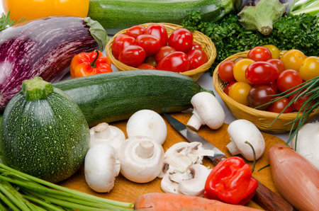 Background of a composition with different fresh vegetablesの写真素材