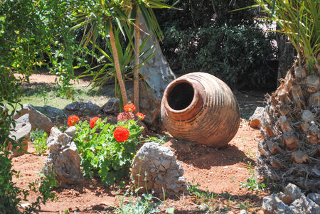 Earthenware jar in a gardenの写真素材