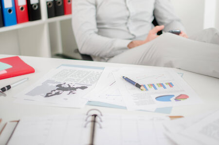 Relaxed businessman with his feet up