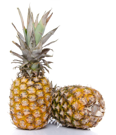 Composition with pineapples, isolated on whiteの写真素材