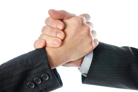Friendly business handshake, isolated on white