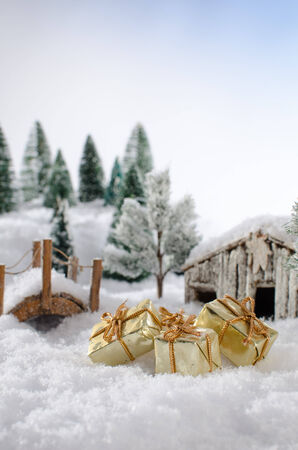 Christmas concept with presents in a winter landscapeの写真素材