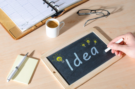 Idea written on a blackboardの写真素材