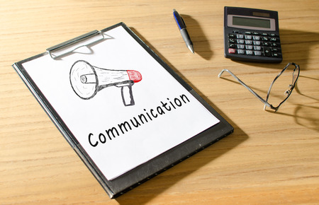 Communication written on a paper sheetの写真素材