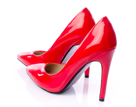 Red shoes with high heels, isolated on whiteの写真素材