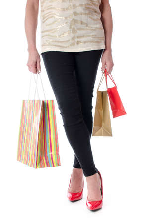Woman with shopping bags, isolated on whiteの写真素材