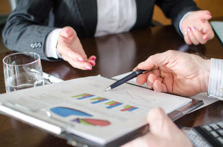 Business people working on a business planの写真素材
