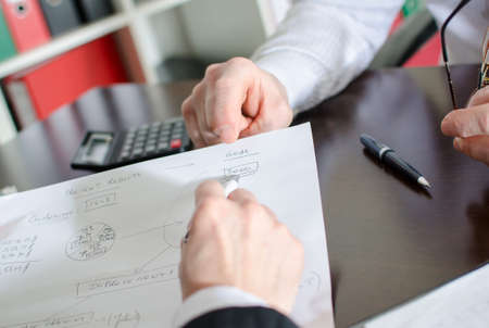 Business people working on a business plan