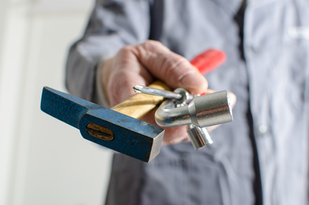 Hand holding different tools, closeupの写真素材