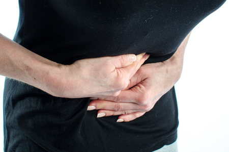 Woman having stomach acheの写真素材