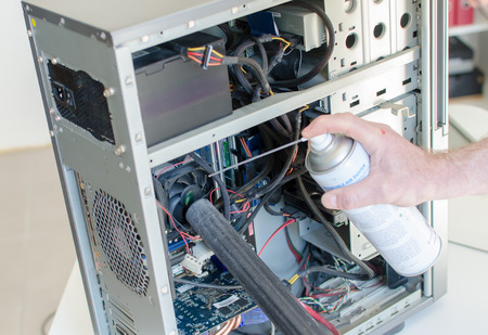 Computer cleaning with dry air