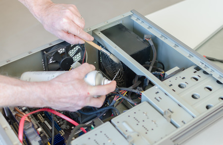 Computer cleaning with dry air