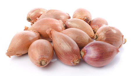 Fresh shallots, isolated on whiteの写真素材
