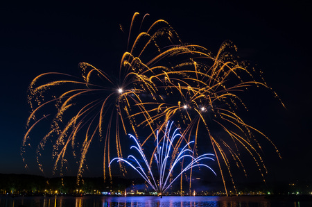 Beautiful fireworks show on a lake