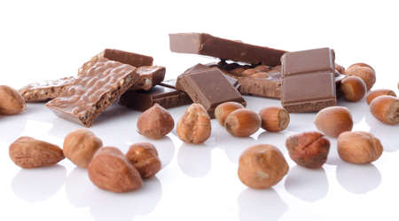 Chocolate with hazelnuts, isolated on white