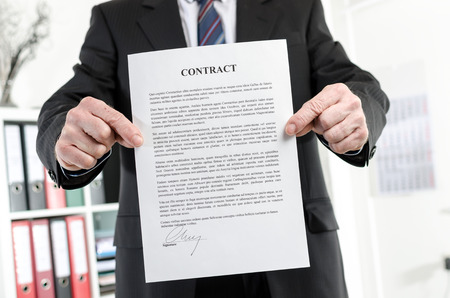 Businessman showing a contractの写真素材