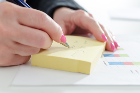 Businesswoman taking notesの写真素材