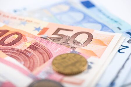 Background of euro banknotes and coins