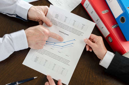 Businesspeople discussing on economic growth