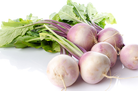 Bunch of fresh turnips, isolated on whiteの写真素材