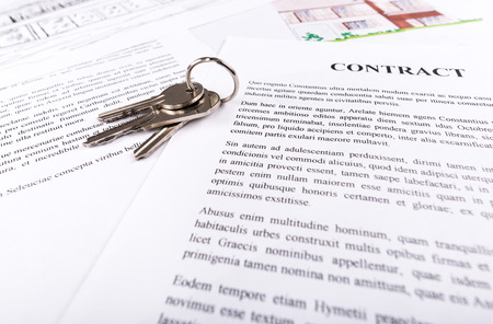 Real estate contract with keys (random latin dummy text used)の写真素材