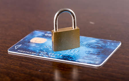 Padlock on a credit card, security conceptの写真素材
