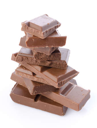 Stack of chocolate squares, isolated on whiteの写真素材