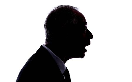 Silhouette of a man expressing the surpriseの写真素材