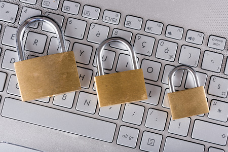Padlocks on computer keyboard