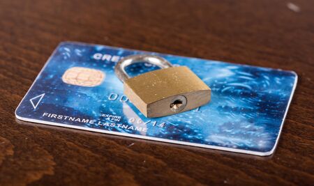 Padlock on a credit card, security conceptの写真素材