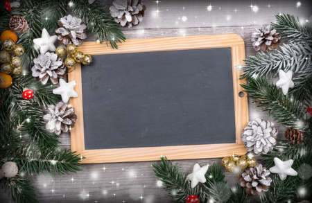 Christmas card with blank slateの写真素材