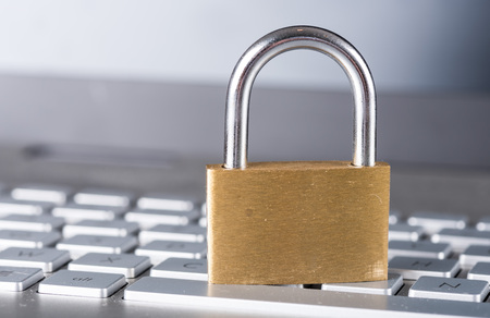 Padlock on computer keyboardの写真素材
