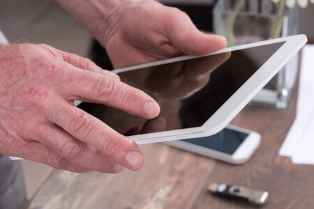 Finger touching tablet computer
