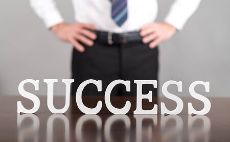 Success concept with a businessman in backgroundの写真素材