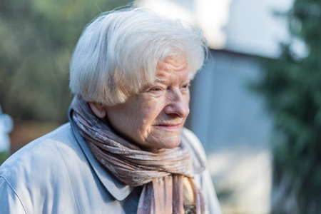 Portrait of senior woman, outdoorsの写真素材