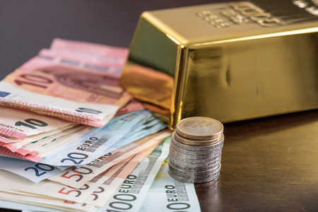 Banknotes, bullion and coinsの写真素材