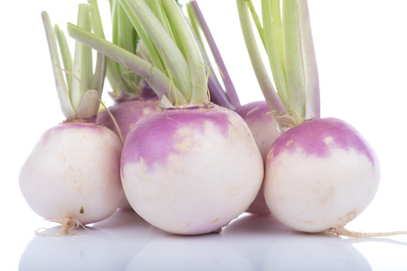 Fresh raw turnips, isolated on whiteの写真素材