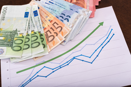 Growth concept with euro banknotes on a chartの写真素材