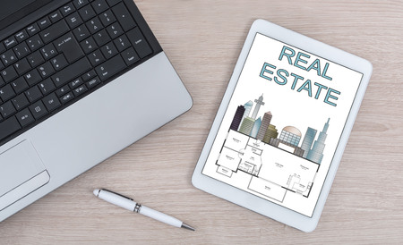Real estate concept shown on a digital tabletの写真素材