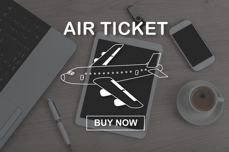 Air ticket booking concept illustrated by a picture on backgroundの写真素材