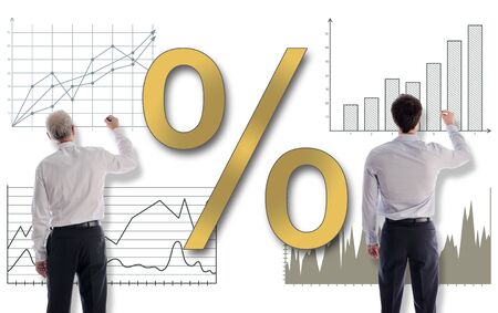 Interest rates concept drawn on a white wall by businessmenの写真素材