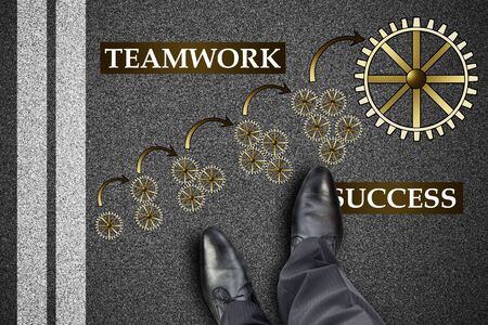Feet in front of teamwork success conceptの写真素材